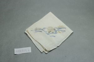 Image of Polar bear with ice bergs, one of a set of 2 embroidered napkins with scenes of polar bears